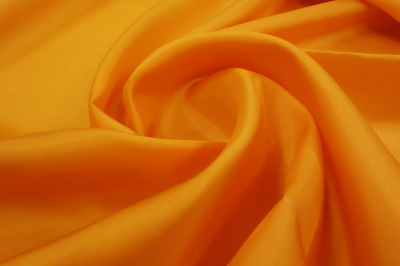 Вискоза артикул. Оранжевая ткань. Ткань желто-оранжевая. Оранжевое сукно. Оранжевый шелк.